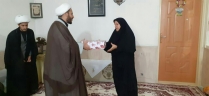ادای احترام به خانواده شهید جاویدالاثر مرتضی زرین جویی